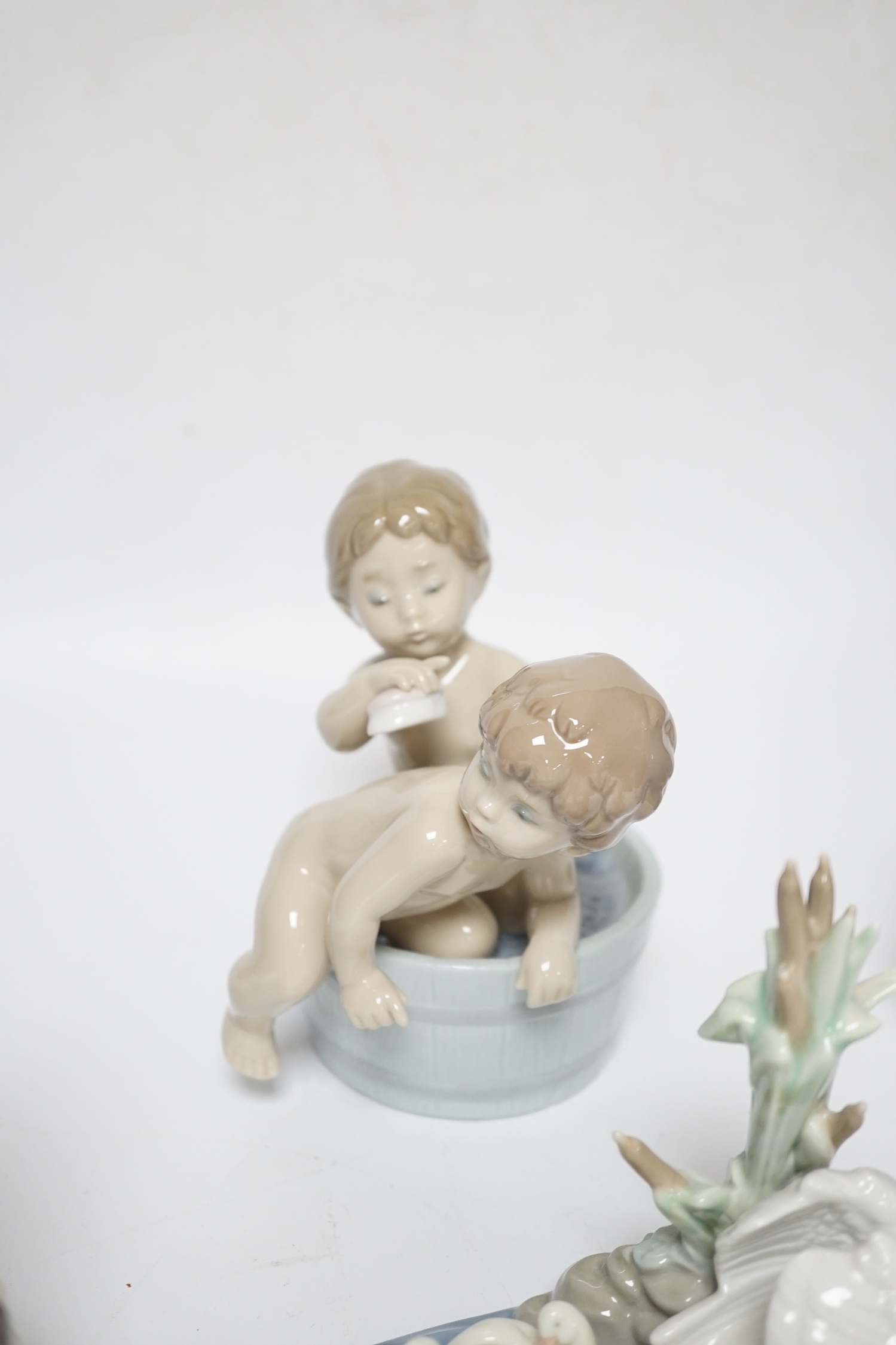Five Lladro figure groups, Follow Me, Hurry Up, Bathtime, Interrupted Nap and another, four boxed
